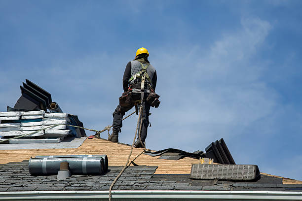 Professional Roof Replacement technician working in Warwick, MA